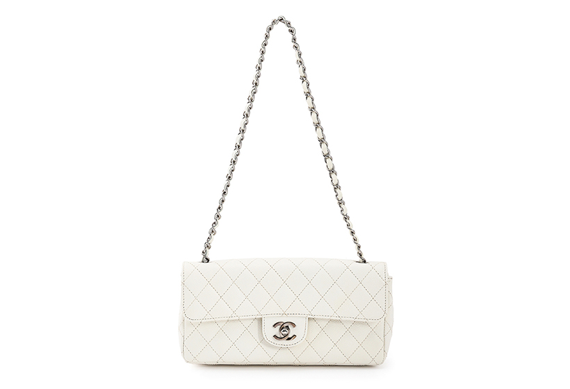14696 Lot 300 Chanel, East West, A White Caviar Leather Quilted Classic Flap Handbag, Circa 2010 Sold For £2,142