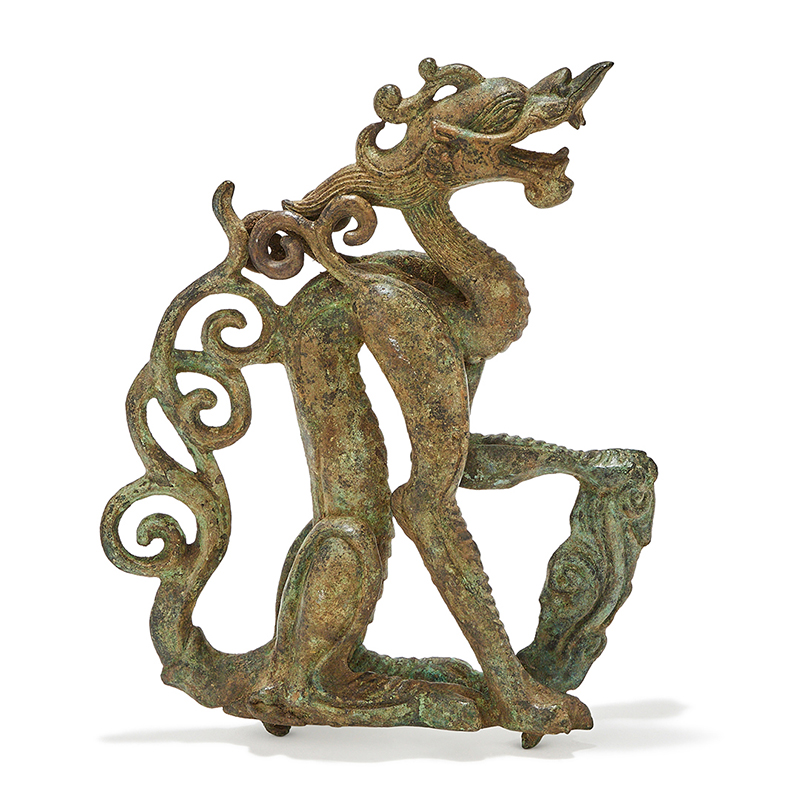 A rare bronze figure of a crouching dragon, possibly Jin dynasty (1115-1234)