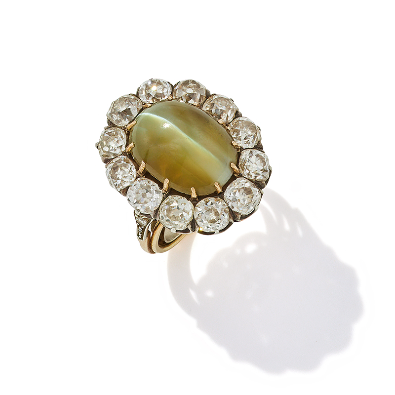 A cat's eye chrysoberyl and diamond cluster ring late 19th century and later