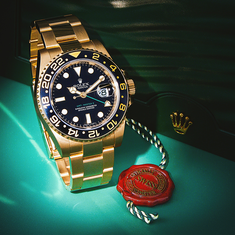 Rolex, Oyster Perpetual Gmt-Master II, 18 carat gold bracelet watch with date