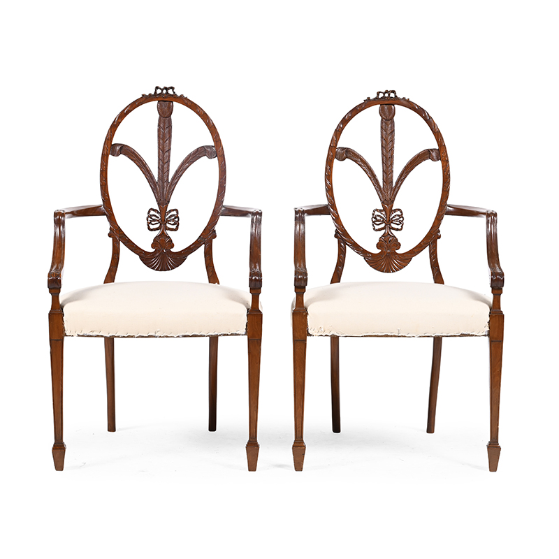 A pair of Victorian solid satinwood armchairs, in George III style, late 19th or early 20th century