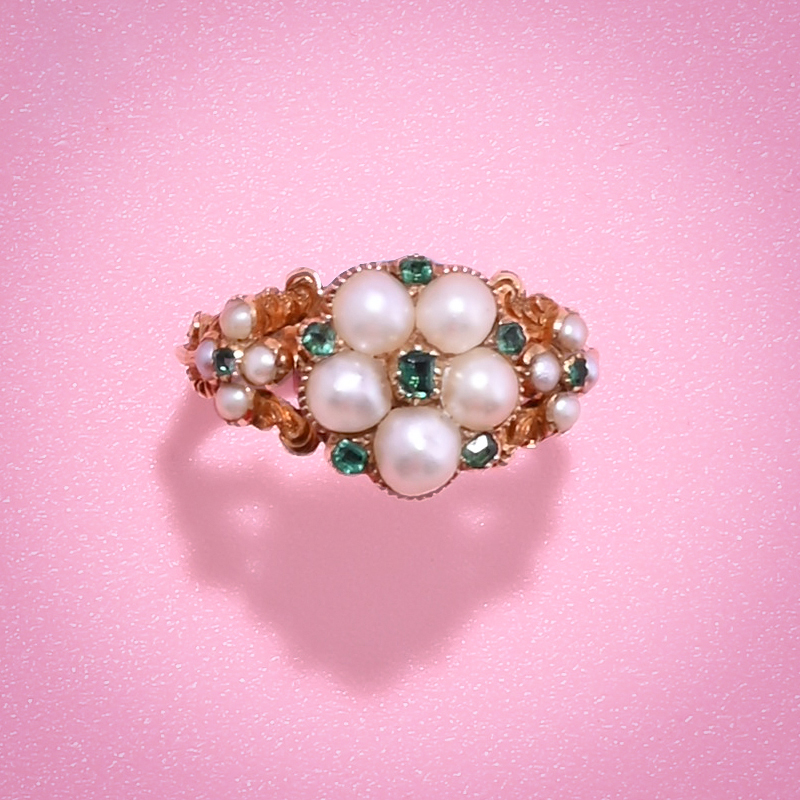 An early Victorian half pearl and emerald cluster ring, circa 1840