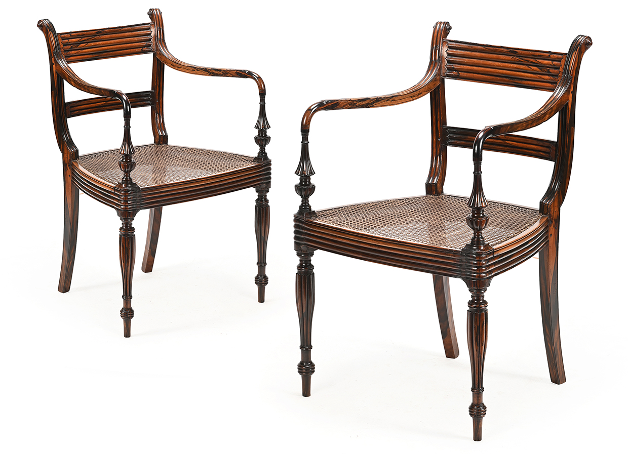 A Pair Of Sinhalese Coromandel Open Armchairs