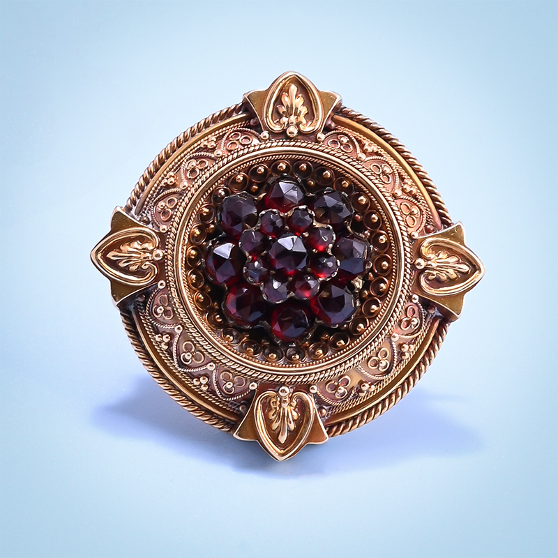 A Victorian bohemian garnet and gold brooch, circa 1880