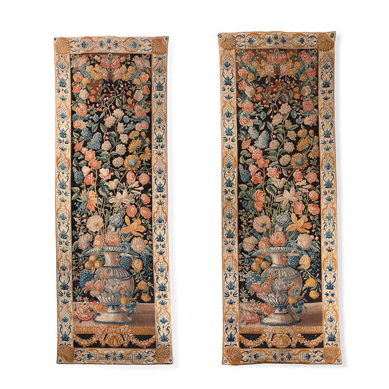 A fine pair of needlework 'Mille Fleurs' hangings, early 18th century