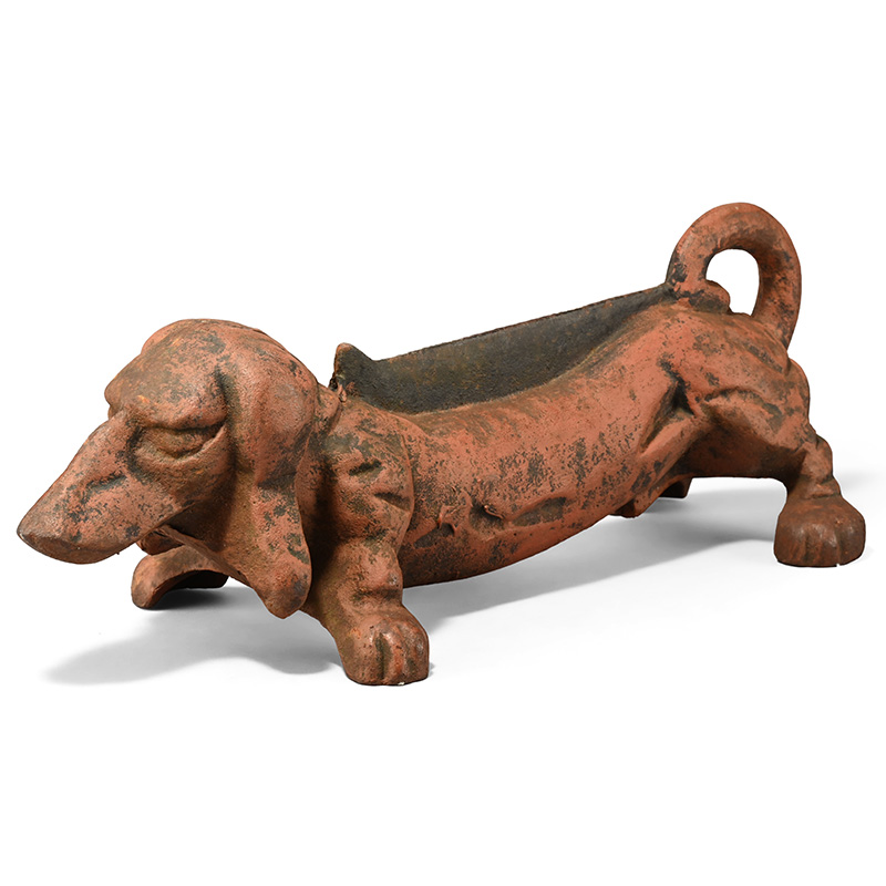 An Art Deco cast iron dacshund boot scraper or door stop, first half 20th century