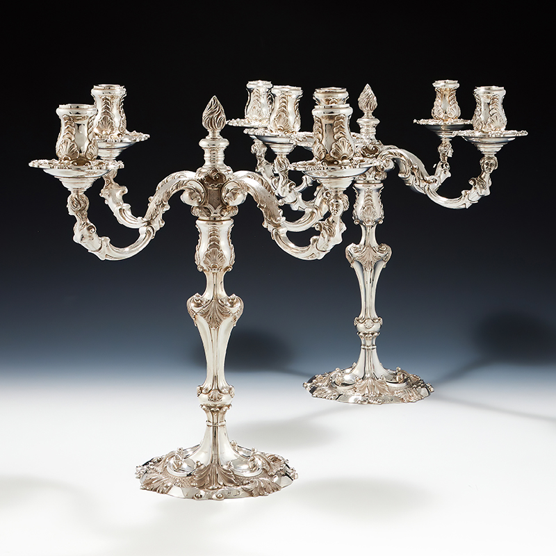 A pair of silver four light candelabra Garrard & Co. Ltd., London 1972