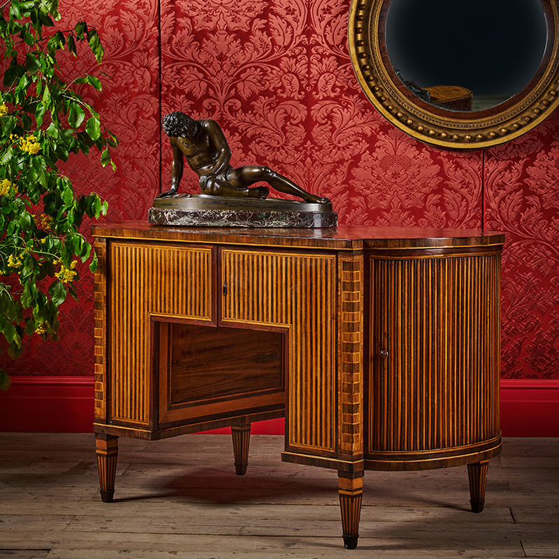 An unusual rosewood and satinwood desk, possibly by an Émigré Maker, late 18th or early 19th century