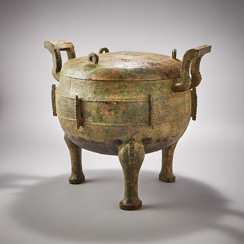 A large Chinese bronze archaic food vessel and cover, ding, Eastern Zhou dynasty (770–256 BC)